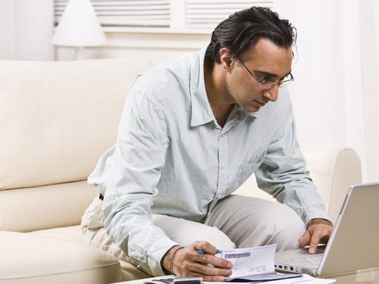 After making a mobile deposit, Kim Komando recommends keeping the check for 14 days to make sure it has cleared.
