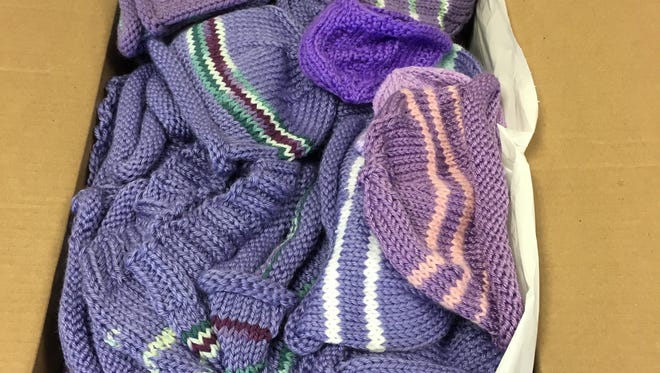 Knitters at the Liberty Corner Presbyterian Church in Bernards made 100 hats for the Click for Babies Campaign. They arrived on Tuesday.