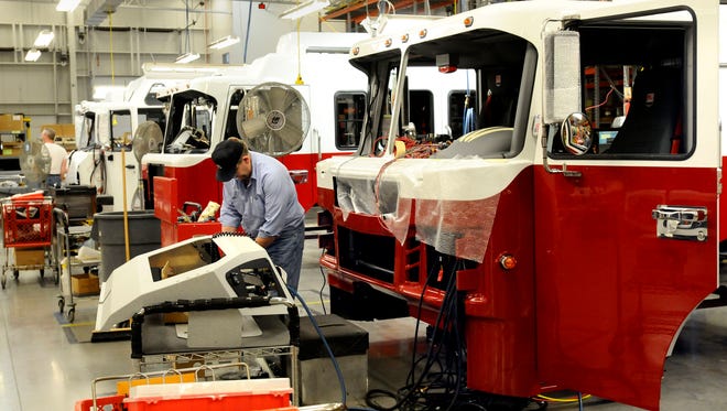 Spartan Motors builds fire truck cabs in Charlotte in May 2010.