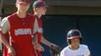 White team player Gabe Summers runs to second base