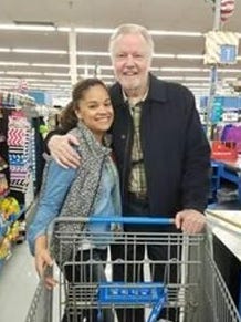 A post on the Home of the Innocents Facebook page shows actor Jon Voight and employee Sydney Gholstson in the check-out line at the Walmart on Hurstbourne Lane