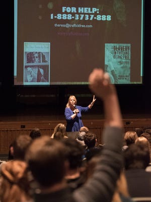 Theresa Flores takes questions as she talks to a group of students at Chillicothe High School about her experiences in sex trafficking and the way our society perceives sexualized images in our popular culture on January 25, 2018. 