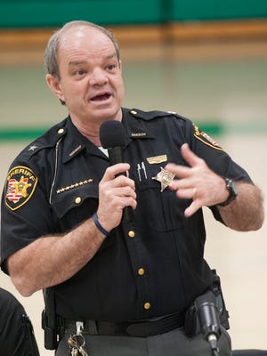 Ross County Sheriff George Lavender takes questions and addresses from concerned at Huntington High School earlier this year. Lavender told county commissioners this week that more personnel is needed in road patrol and dispatch to adequately serve the county's law enforcement needs in 2019.
