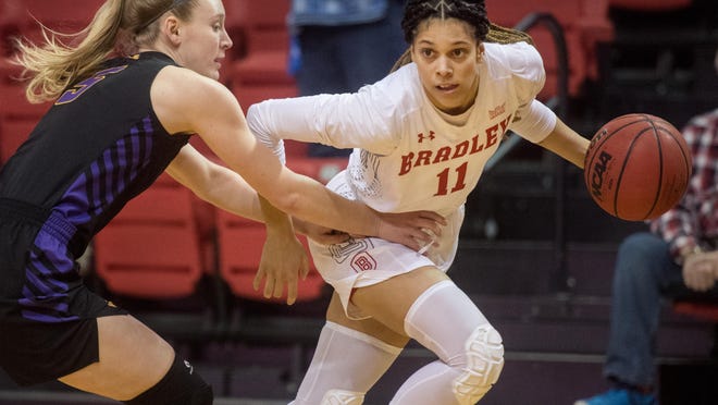 Bradley's Lasha Petree moves the ball past Northern Iowa's Nicole Kroeger in the first half Friday, Jan. 24, 2020 at Renaissance Coliseum on the Bradley campus. She was named MVC preseason Player of the Year on Tuesday, Oct. 13, 2020.