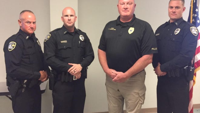 Aaron Lewis Jr. (left), Officer James Wiggins, Chief Shane McWilliams and Officer Briton Hampson were recently sworn in to the Bossier City Police Department.