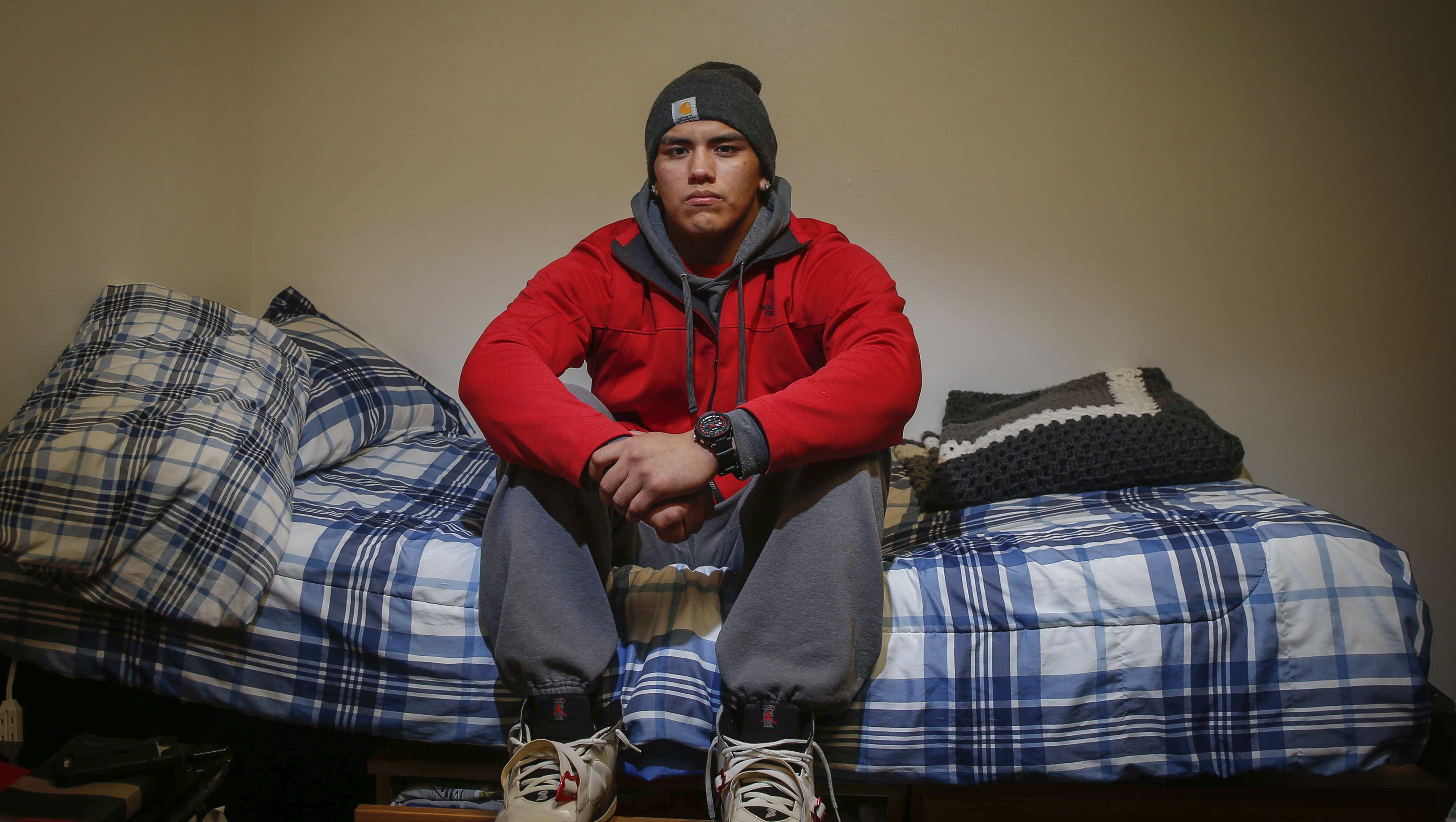A homeless teen needed help. Then he came to Iowa and wrestled.