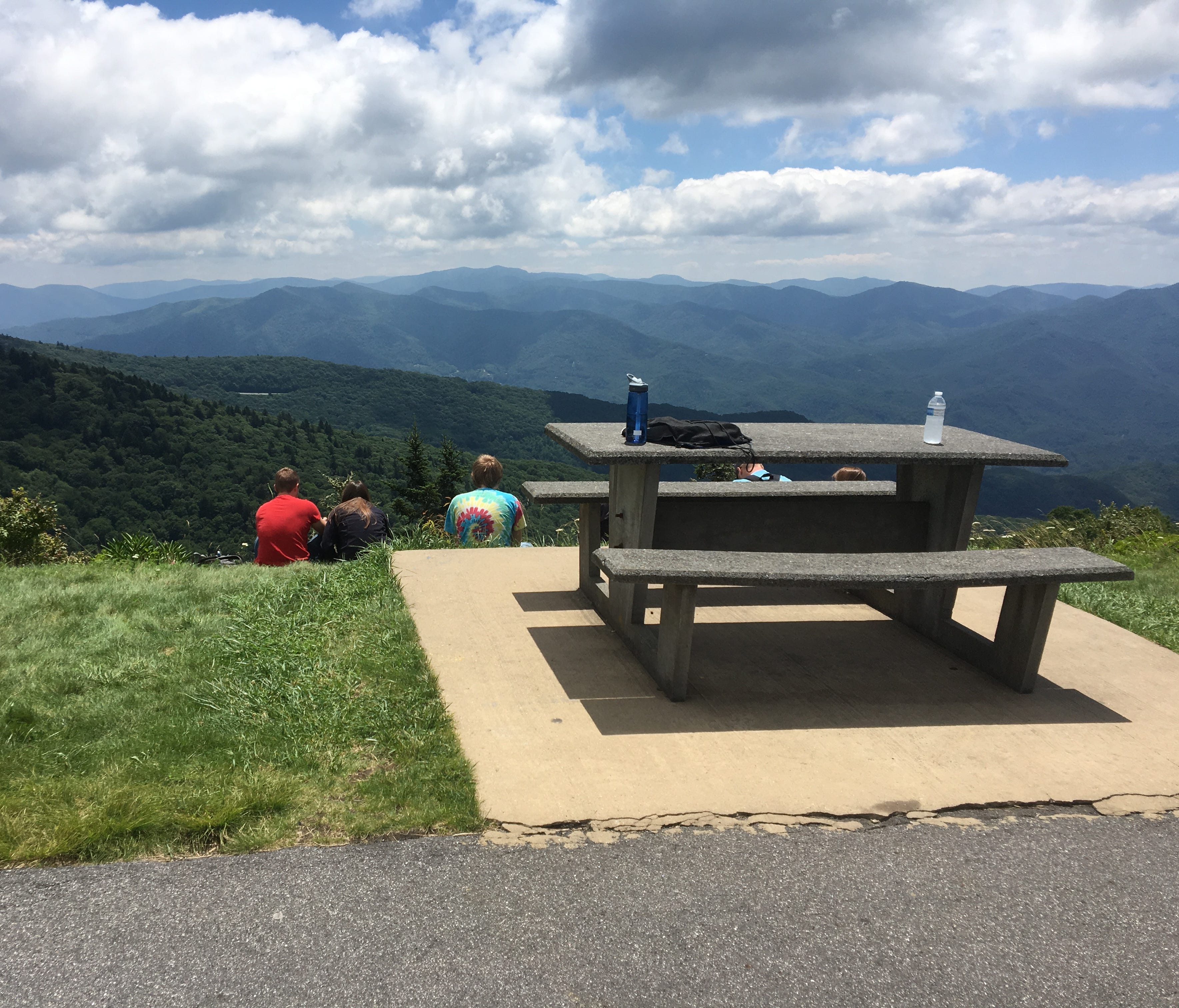 Visitors to Waterrock Knob on the Blue Ridge Parkway enjoy the views while picnicking. Waterrock Knob, at over 6,000 feet elevation, will experience solar eclipse totality for 44 seconds.