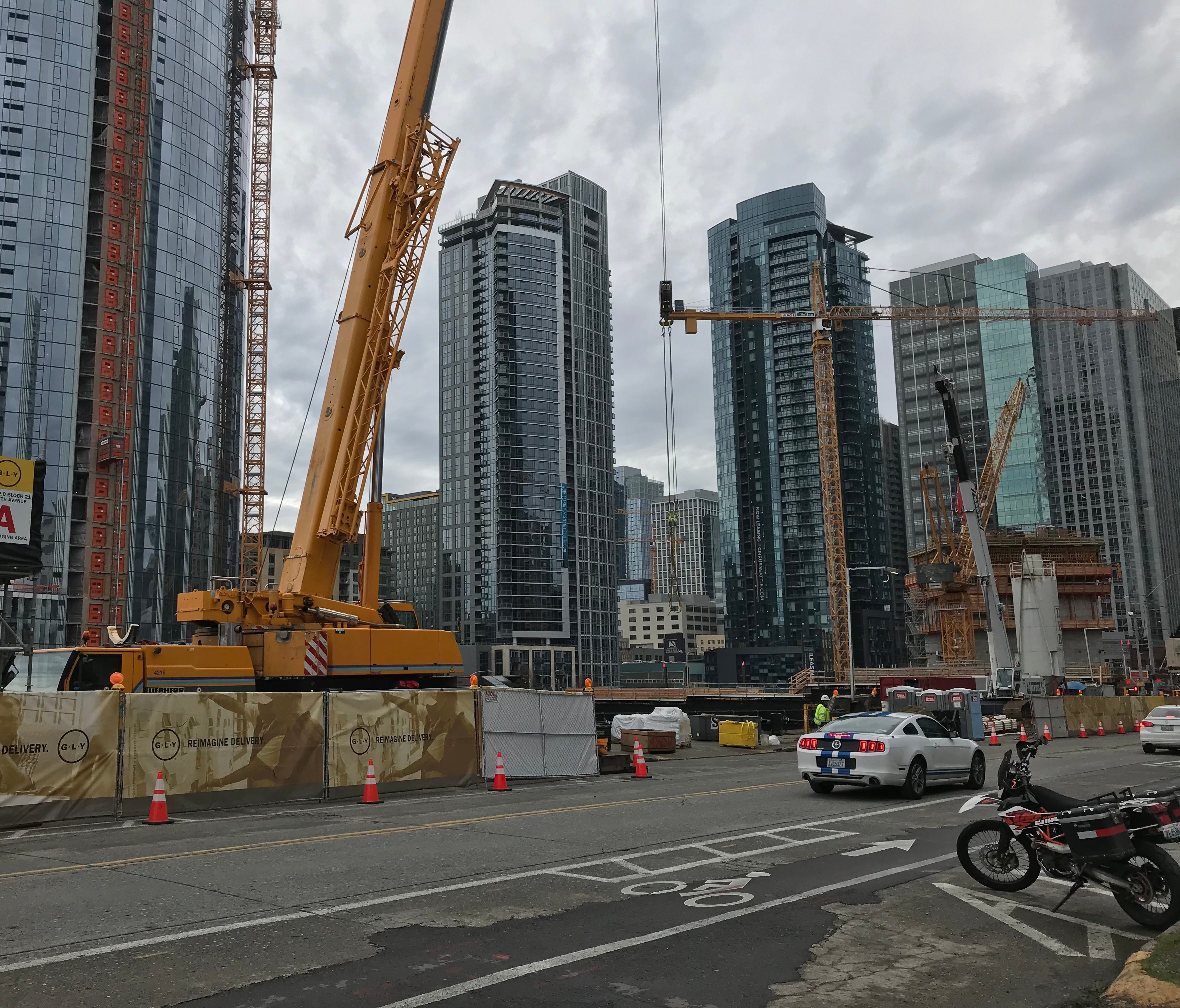 A street near Amazon headquarters in downtown Seattle, where cranes dot the sky as new office buildings, condos and apartments are built.