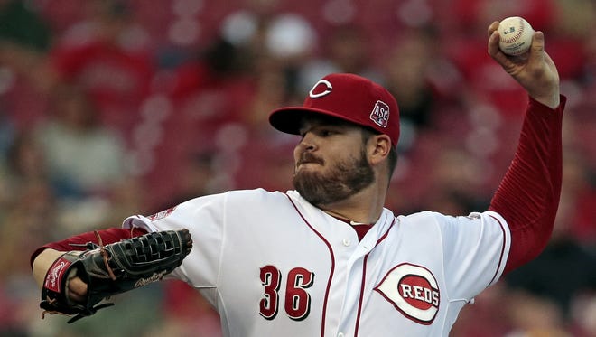 Cincinnati Reds starting pitcher David Holmberg (36) delivers a pitch in the top of the second inning of the MLB game between the Cincinnati Reds and the Los Angeles Dodgers at Great American Ball Park in Cincinnati on Wednesday, Aug. 26, 2015.