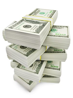Stack of dollars on white background