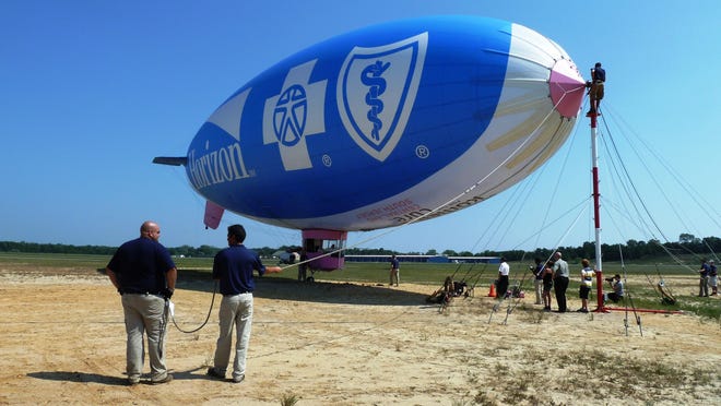 A balloon bearing the Horizon Blue Cross Blue Shield logo.