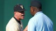 Tim Corbin argues with first base umpire Al Davis after