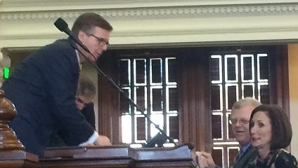 Lt. Gov. Dan Patrick confers with Sens. Paul Bettencourt and Lois Kolkhorst before the debate on the "bathroom bill" begins in the Texas Senate on March 14, 2017.