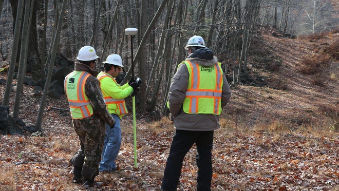 A crew from Spectra Energy surveys an area in the Blue Mountain Reservation in Cortlandt in November, 2014. The company is planning on replacing and partially rerouting the Algonquin Pipeline through Westchester and Rockland.