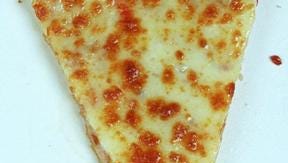A slice of LaRosa's cheese pizza