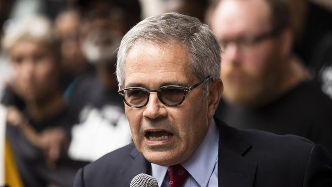 FILE - In this Thursday, Sept. 5, 2019, file photo, Philadelphia District Attorney Larry Krasner speaks outside the federal courthouse in Philadelphia. The Pennsylvania Supreme Court on Wednesday, Sept. 11, 2019, will consider whether the state's death penalty statute amounts to cruel, arbitrary punishment that's too often reserved for black and poor defendants. Krasner opposes capital punishment and is a driving force behind the court challenge. (AP Photo/Matt Rourke, File)