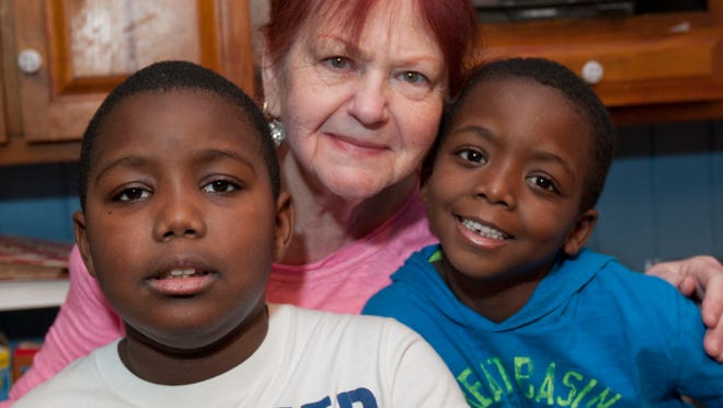 Roberta Milano, seen here in her Aberdeen home with two of the children she cares for, Tyrese Stafford (left), 10 and Emanuel Milano, 7, recently needed help from Press on Your Side in a dispute with Cablevision.