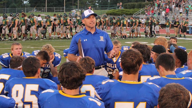 Bolivar football coach Lance Roweton (standing) hopes his team can follow up on a strong 2014 season that included a seven-game winning streak.