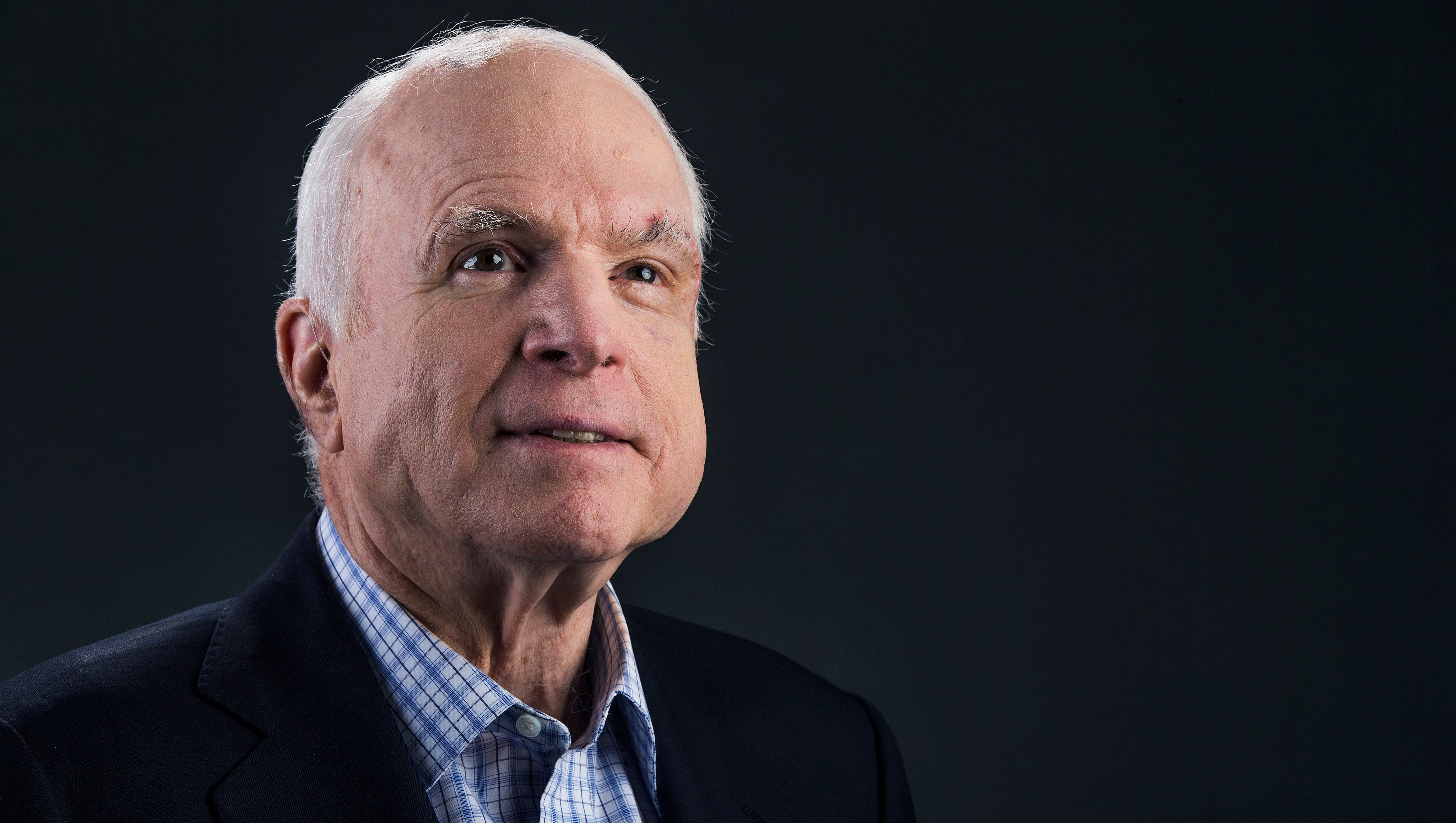 Sen. John McCain poses at the Republic Media building