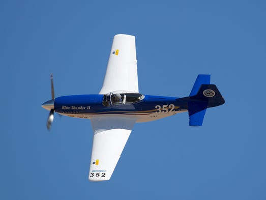 John Parker, from Reno, flies his Mustang Blue Thunder