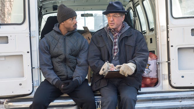Michael B. Jordan, left, as Adonis Johnson and Sylvester Stallone as Rocky Balboa in "Creed."