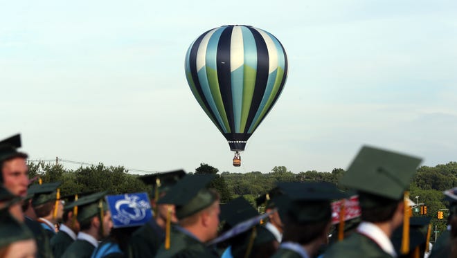 Class of 2016 Commencement for North Hunterdon High School held in Annadale on Wednesday June 15, 2016.A hot air balloon rises above the graduating Class of 2016