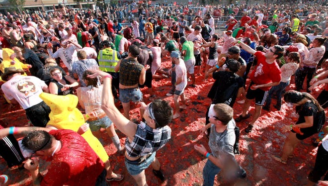 The East Side Tomato Romp, featuring a massive tomato fight, celebrates its 10th anniversary on Sept. 10.