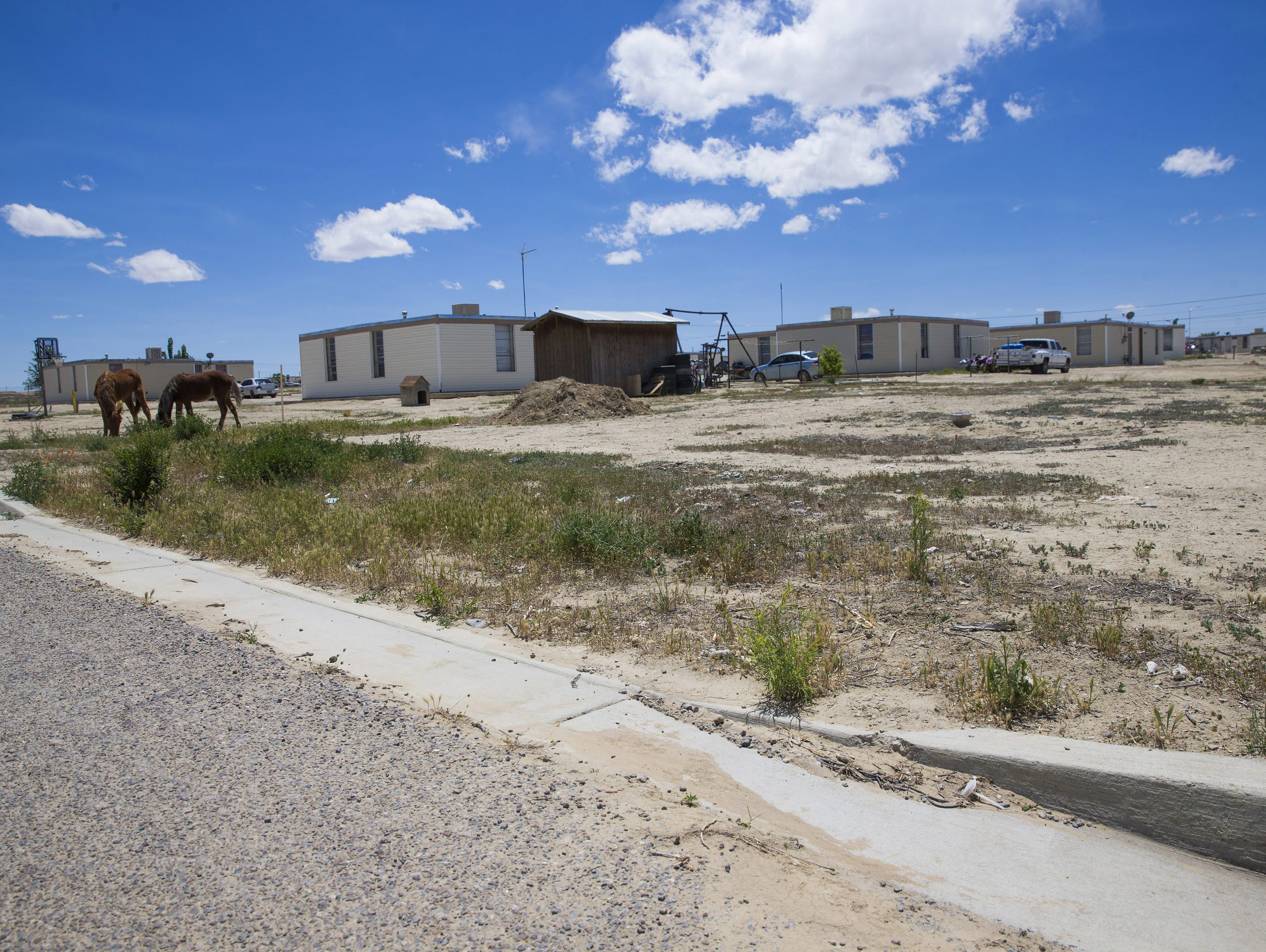 Sen. John McCain's report calls for a new board of directors at the Navajo Housing Authority, possible cutbacks in Navajo housing funds by Congress, and the creation of a separate agency to handle new-home development for the tribe.