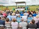 A crowd listens to speakers Friday, May 31, 2018, during
