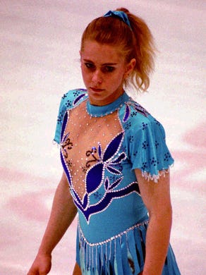 Figure skater Tonya Harding sports a new outfit during practice in Portland...