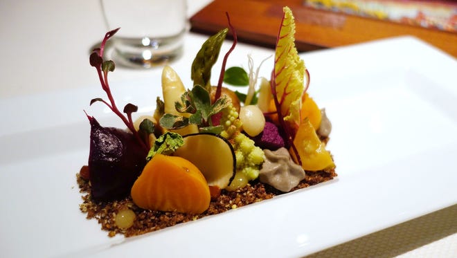 Fine-dining restaurant Kai offers artfully presented dishes like "preserved garden" (pictured).