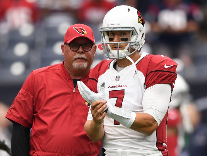Arizona Cardinals head coach Bruce Arians talks to