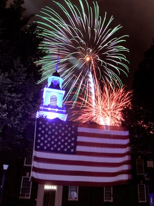 Fireworks explode over the state capitol in Dover on Saturday.