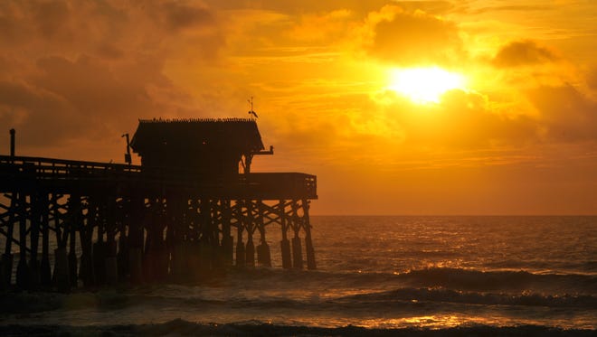 Shown is the Cocoa Beach Pier just after sunrise on Aug. 31.