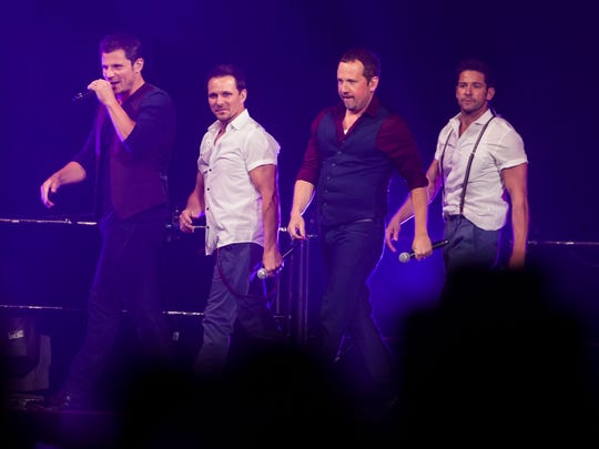 From left, Nick Lachey, Drew Lachey, Justin Jeffre
and Jeff Timmons of 98 Degrees perform at the Jobing.com Arena on Sunday, July 14, 2013 in Glendale, Arizona. Stacie Scott/The Arizona Republic