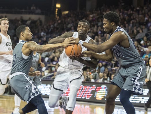 GCU's Oscar Frayer (4) and Longwood's Damarion Geter