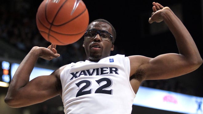 Jamel McLean after a dunk for Xavier in December of 2010.