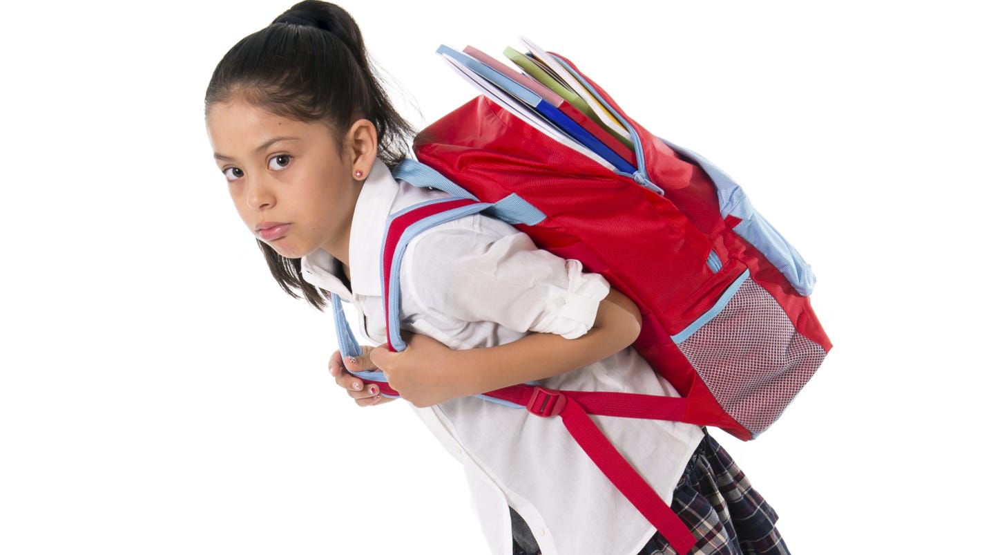 Carrying a heavy backpack could create lifelong health issues