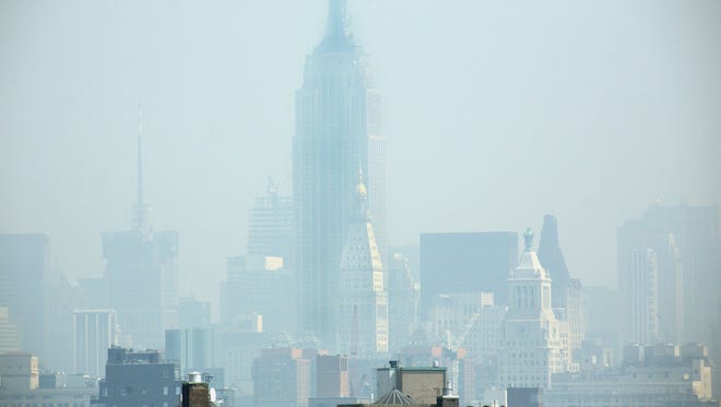 Smog covers midtown Manhattan in New York City on July 10, 2007.