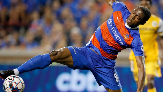 FC Cincinnati forward Fanendo Adi (9) stretches for the ball in the second half of the USL soccer match between the FC Cincinnati and the Nashville SC at Nippert Stadium in Cincinnati on Saturday, Aug. 4, 2018. FC Cincinnati gave up a late goal and settled for a 1-1 tie against Nashville. 