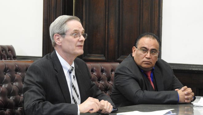 Dr. David Velasquez, right, will serve three years of community control for prescribing appetite suppressants to patients at his former weight-loss center. Defense attorney Dennis McNamara, left, said he will appeal the doctor's convictions.