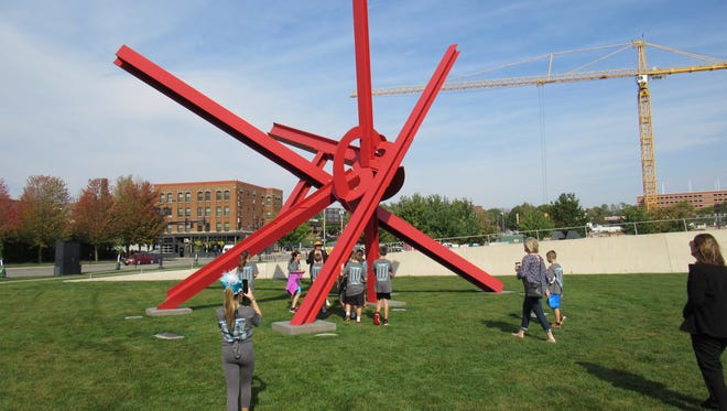 Prairie Trail Elementary fifth-graders look at a sculpture at the Pappajohn Sculpture Park during a field trip. Students interpreted the art and discussed its meaning. They also visited the Des Moines Art Center.