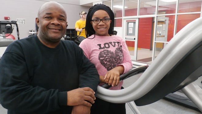 Selma City Attorney Jimmy Nunn and his daughter Jimaya work out early in the morning at the Selma-Dallas County YMCA.