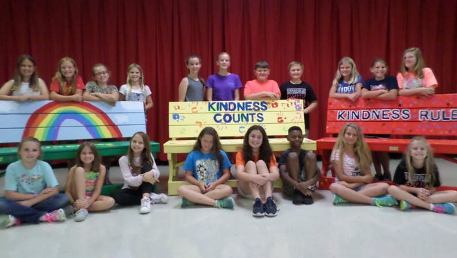 The Shadeville Student Council and the "kindness benches" they created.