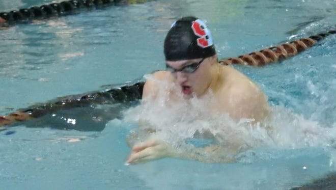 Sturgeon Bay co-op's Max McHugh competes in the breaststroke.