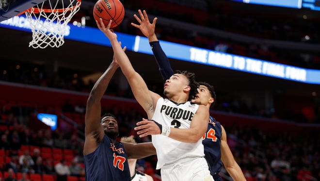 Purdue Boilermakers guard Carsen Edwards (3) goes to the net in the first half against the Cal State Fullerton Titans in the first round of the 2018 NCAA Tournament at Little Caesars Arena on Mar 16, 2018; Detroit, MI, USA.