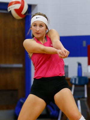 Athens junior Paige Vitort returned to the volleyball court in August roughly 10 months after she tore the ACL in her left knee.