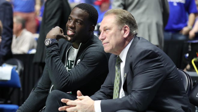 Mar 19, 2017; Tulsa, OK, USA; Golden State Warriors power forward Draymond Green speaks to Michigan State Spartans head coach Tom Izzo before the game between the Kansas Jayhawks and the Michigan State Spartans in the second round of the 2017 NCAA Tournament at BOK Center. Mandatory Credit: Brett Rojo-USA TODAY Sports