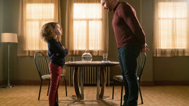 Sophie (Chloe Coleman) demands a spying lesson from JJ (Dave Bautista).