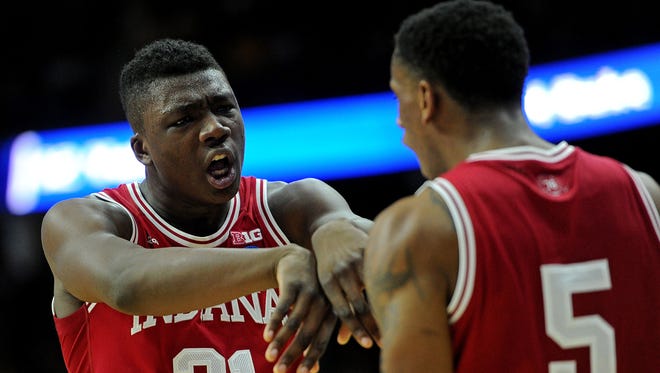 Hoosiers center Thomas Bryant (31) celebrates with Indiana Hoosiers forward Troy Williams (5) after a play in the second half against the Kentucky Wildcats during the second round of the 2016 NCAA Tournament at Wells Fargo Arena.
